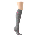 Gray knee-high socks with a polka dot pattern in pink, red, and white colors.